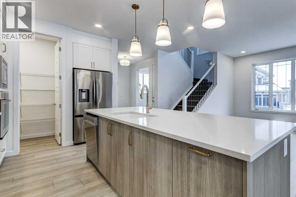 9 Magnolia Path Se, Calgary, Alberta  T3M 3T4 - Photo 9 - A2273281