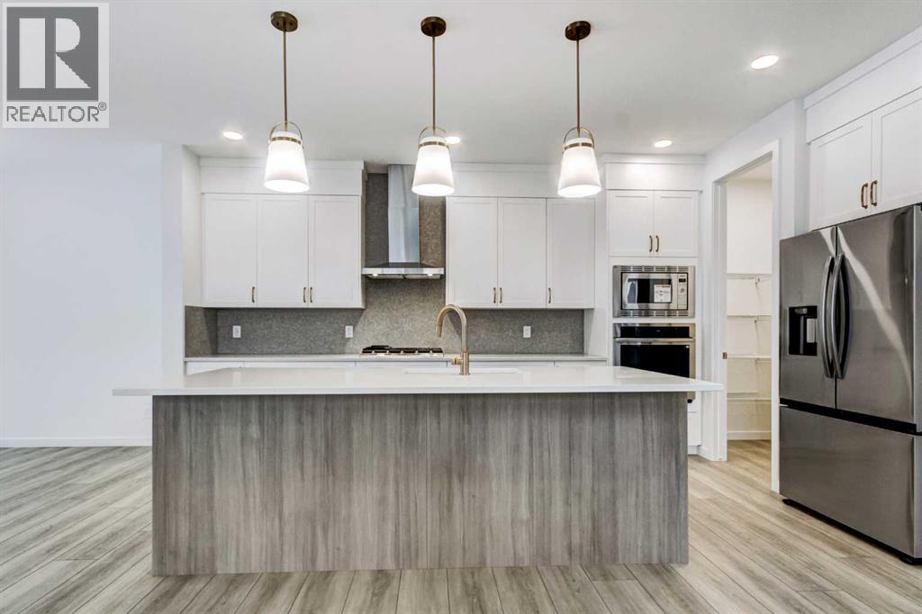 9 Magnolia Path Se, Calgary, Alberta  T3M 3T4 - Photo 10 - A2273281