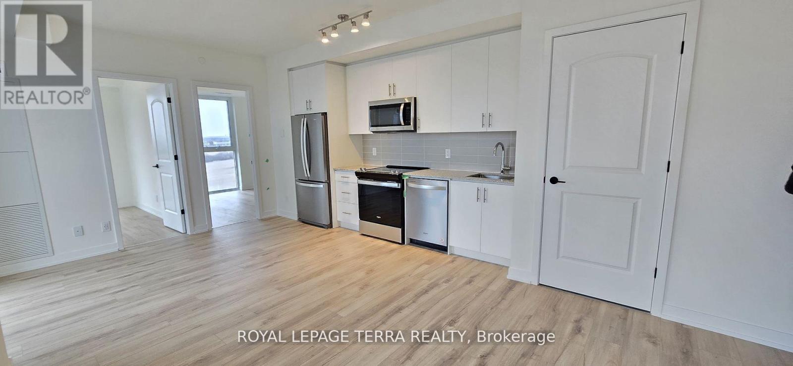 610 - 335 Wheat Boom Drive, Oakville, Ontario  L6H 3V6 - Photo 2 - W12654892