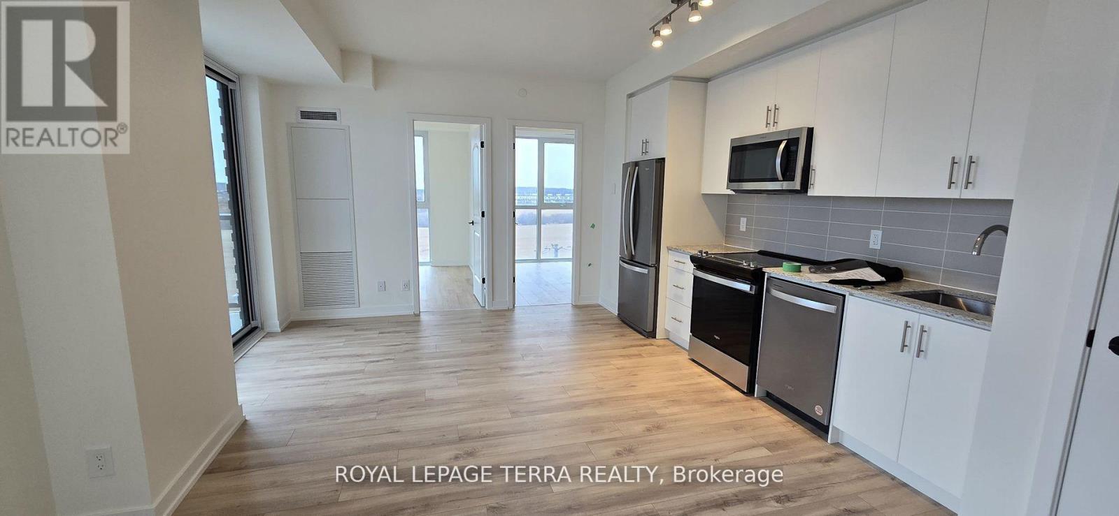 610 - 335 Wheat Boom Drive, Oakville, Ontario  L6H 3V6 - Photo 3 - W12654892