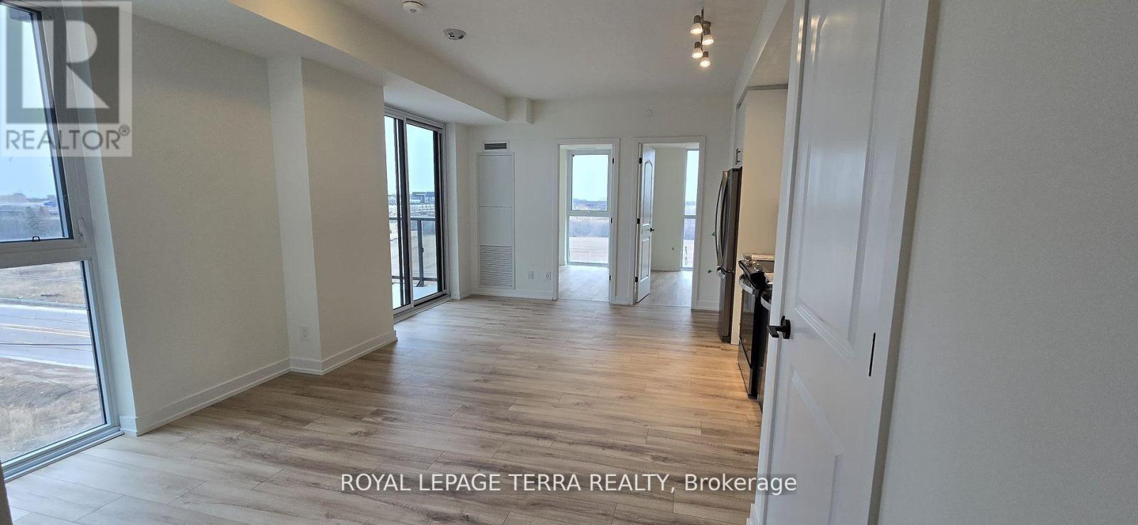 610 - 335 Wheat Boom Drive, Oakville, Ontario  L6H 3V6 - Photo 4 - W12654892