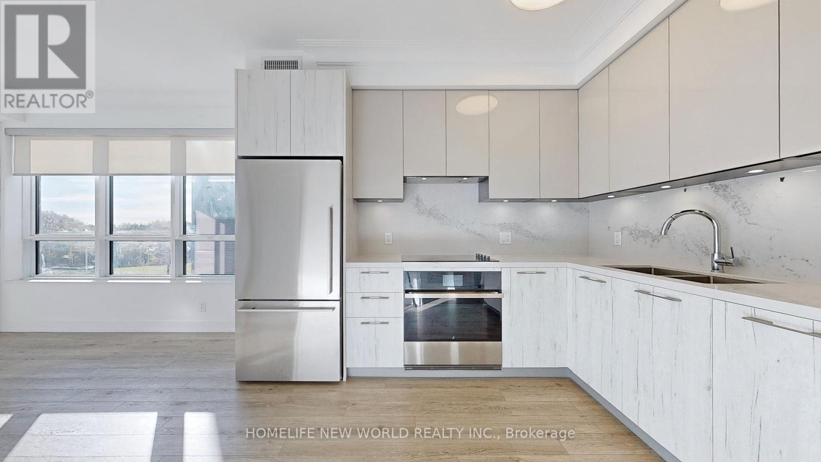 303 - 18 Water Walk Drive, Markham, Ontario  L3R 6L5 - Photo 11 - N12655136