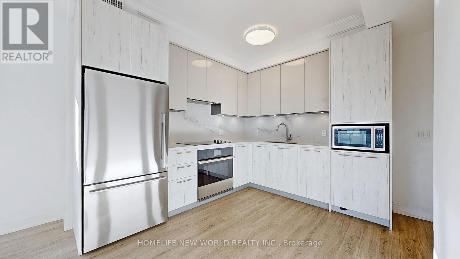 303 - 18 Water Walk Drive, Markham, Ontario  L3R 6L5 - Photo 9 - N12655136