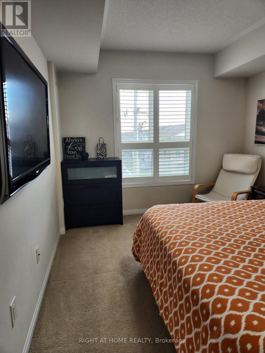 407 - 1045 Nadalin Heights, Milton, Ontario  L9T 8R5 - Photo 4 - W12655156