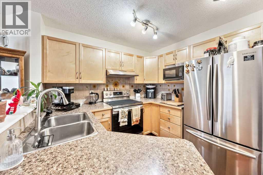 11 Saddlebrook Mews Ne, Calgary, Alberta  T3J 0B3 - Photo 10 - A2274153