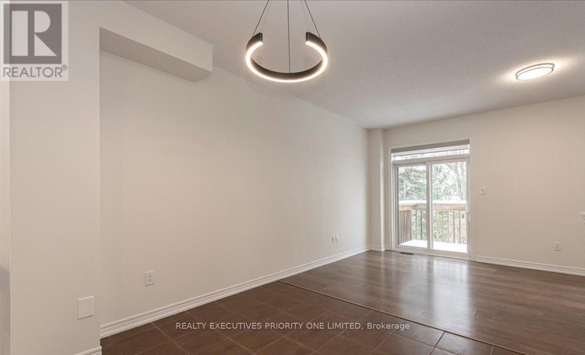 60 Greenwood Drive, Essa (Angus), Ontario  L0M 1B5 - Photo 7 - N12655492