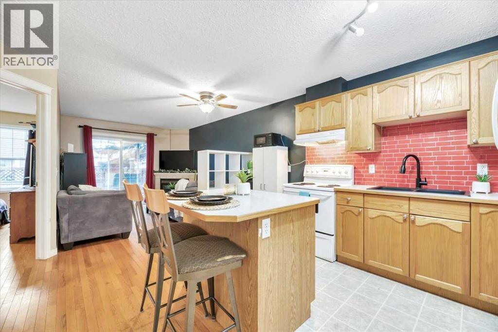 411, 103 Strathaven Drive, Strathmore, Alberta  T1P 1W4 - Photo 1 - A2271025