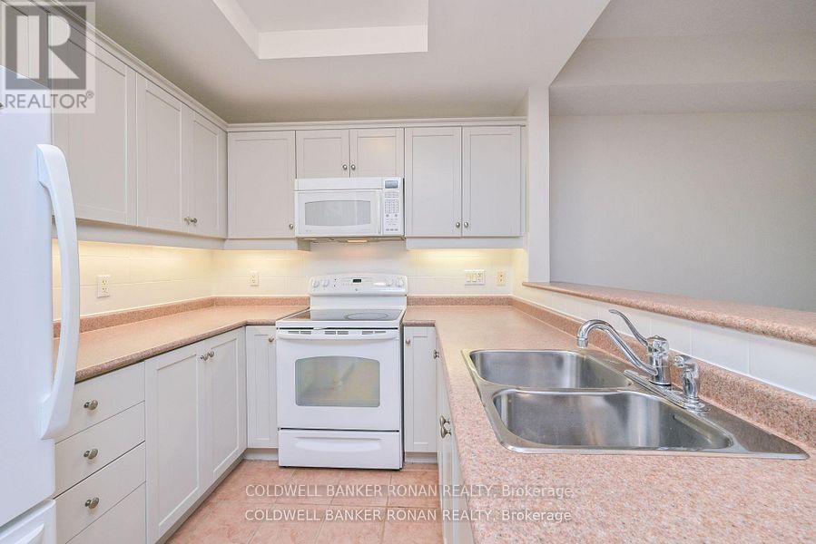 202 - 78 Sunset Boulevard, New Tecumseth, Ontario  L9R 2H5 - Photo 5 - N12656412