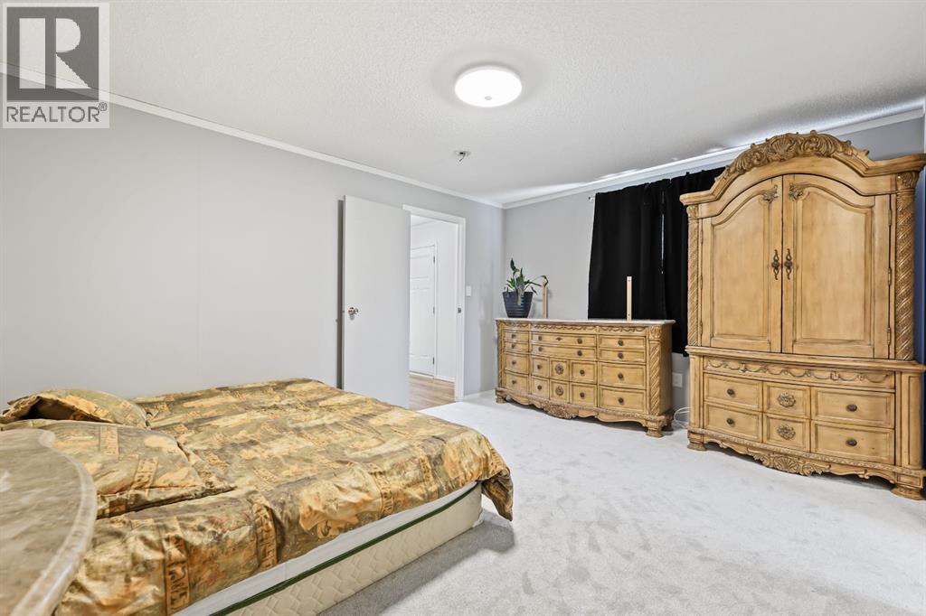 305 Stanley Avenue, Okotoks, Alberta  T1S 1M5 - Photo 12 - A2256943