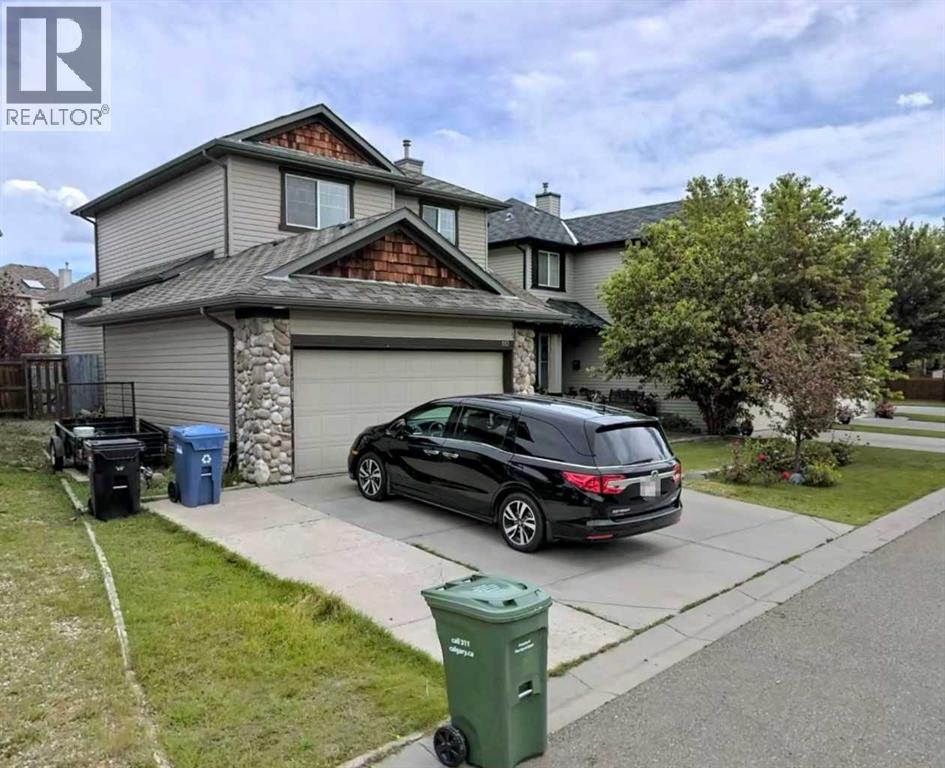 110 Tuscany Ravine Bay Nw, Calgary, Alberta  T3L 2S9 - Photo 4 - A2276637