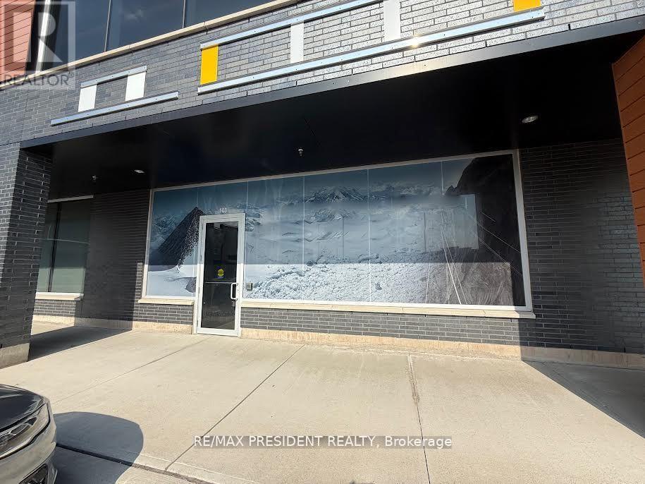 B103 - 1943 Ironoak Way, Oakville, Ontario  L6H 3V7 - Photo 2 - W12656836