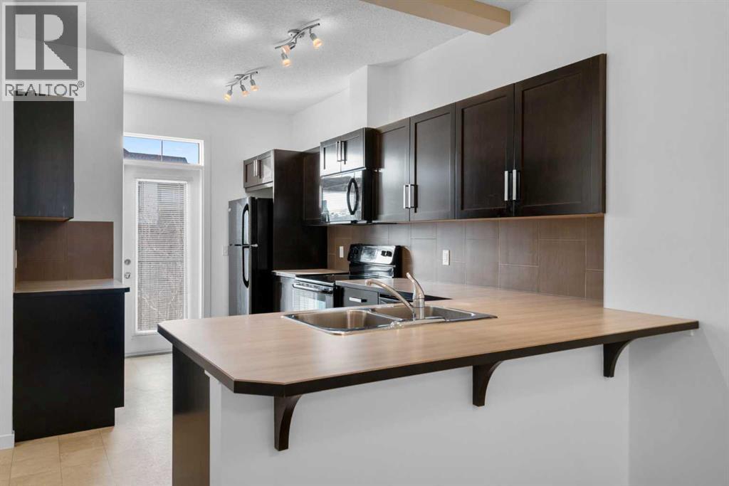 114 New Brighton Landing Se, Calgary, Alberta  T2Z 1C1 - Photo 2 - A2270829