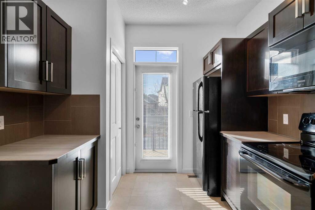 114 New Brighton Landing Se, Calgary, Alberta  T2Z 1C1 - Photo 4 - A2270829