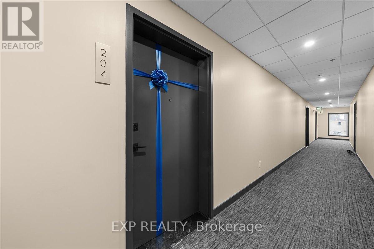 204 - 3600 Brian Coburn Boulevard, Ottawa, Ontario K4A 5T8 - Photo 2 - X12657170