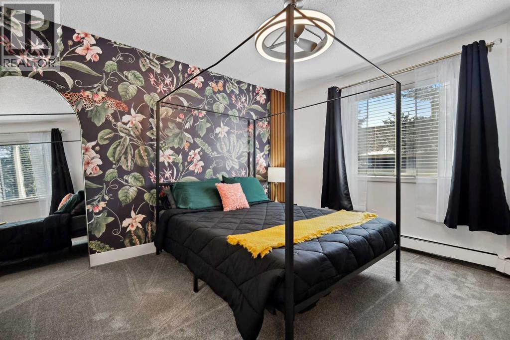 210, 10 Sierra Morena Mews Sw, Calgary, Alberta  T3H 3K5 - Photo 3 - A2251699