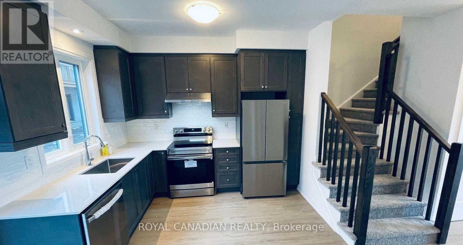 75 - 55 Tom Brown Drive, Brant, Ontario  N3L 0N5 - Photo 2 - X12657480