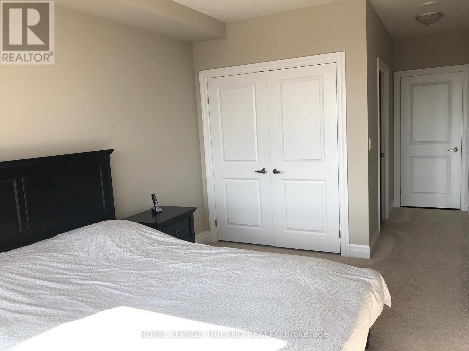 607 - 240 Villagewalk Boulevard, London North, Ontario  N6G 0W6 - Photo 8 - X12657620