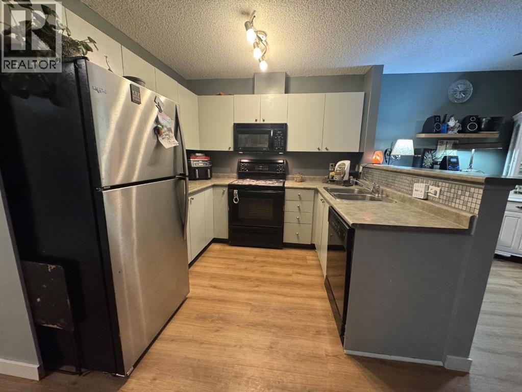 702, 760 Railway Gate Sw, Airdrie, Alberta  T4B 3C5 - Photo 2 - A2276249