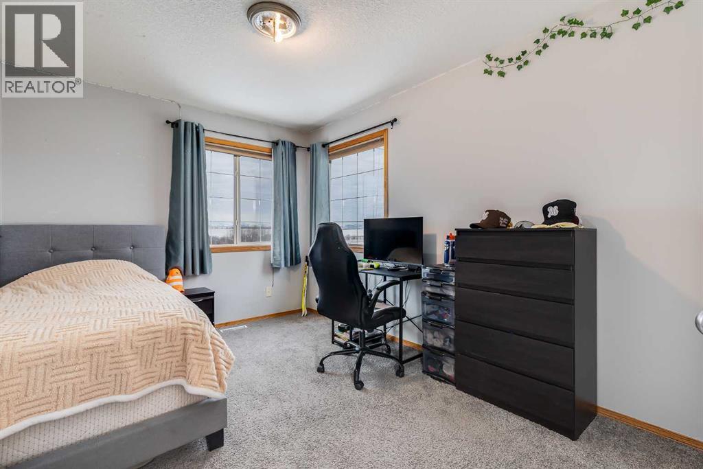 144 Bow Ridge Drive, Cochrane, Alberta  T4C 1V8 - Photo 18 - A2272332