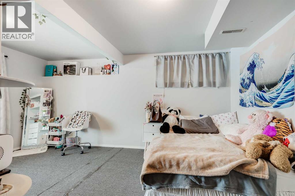 144 Bow Ridge Drive, Cochrane, Alberta  T4C 1V8 - Photo 32 - A2272332