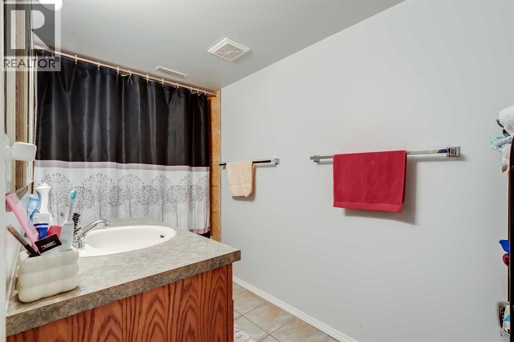 144 Bow Ridge Drive, Cochrane, Alberta  T4C 1V8 - Photo 33 - A2272332