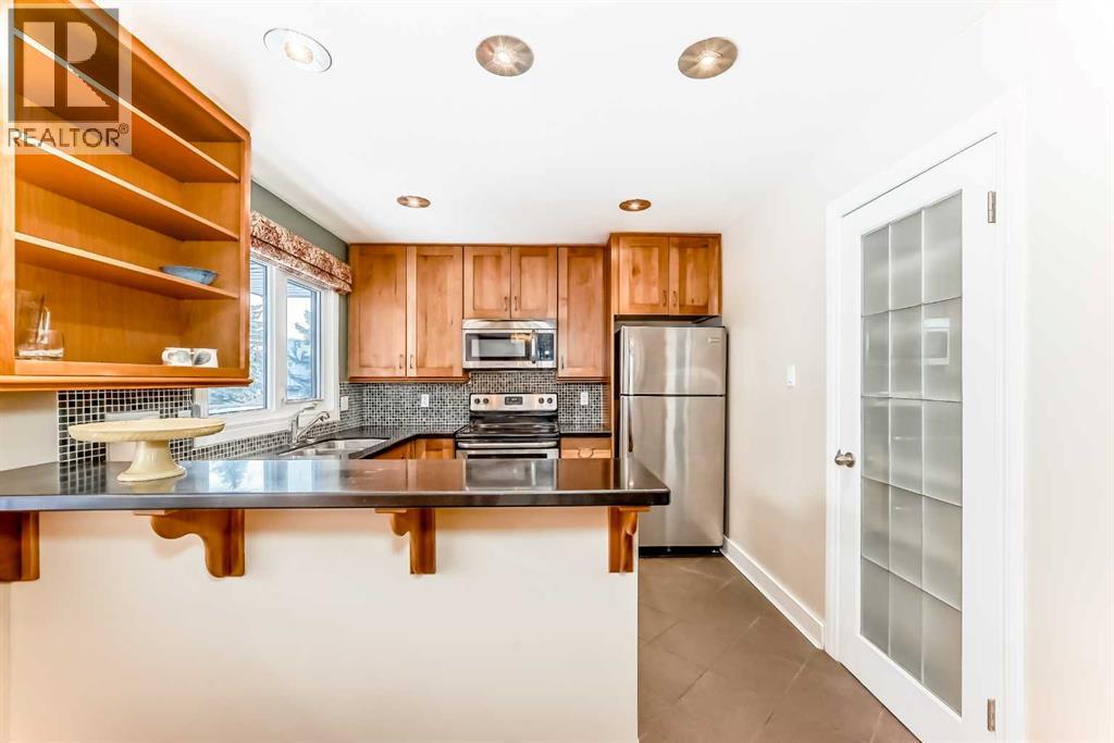 4803 Montana Drive Nw, Calgary, Alberta  T3B 1G3 - Photo 9 - A2276551