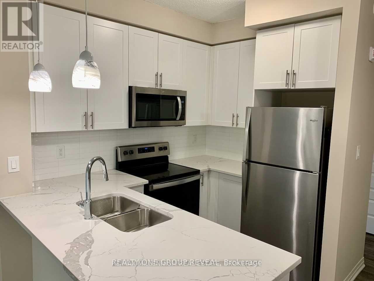 302 - 610 FARMSTEAD DRIVE, Milton, Ontario