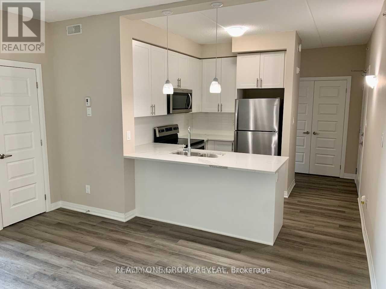 302 - 610 Farmstead Drive, Milton, Ontario  L9T 8X5 - Photo 9 - W12658310