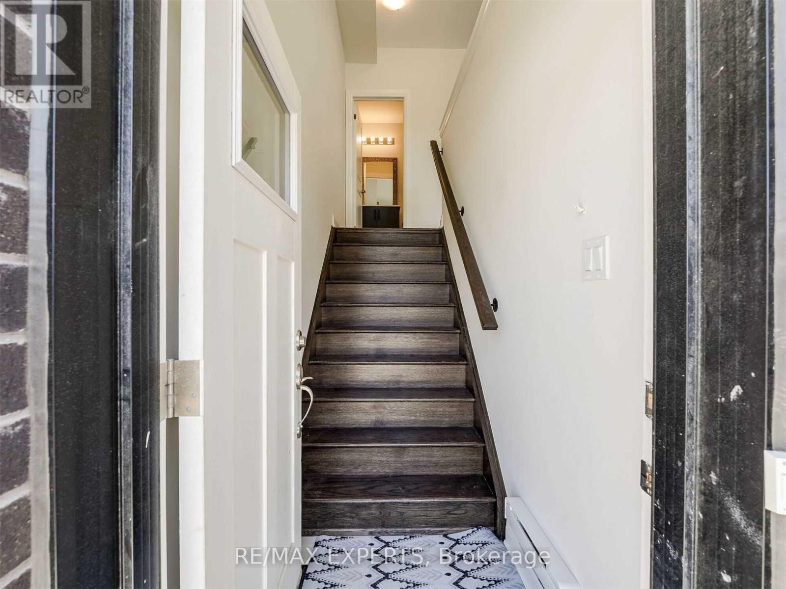 15 Wild Rose Gardens, Toronto, Ontario  M6L 0A5 - Photo 3 - W12658818