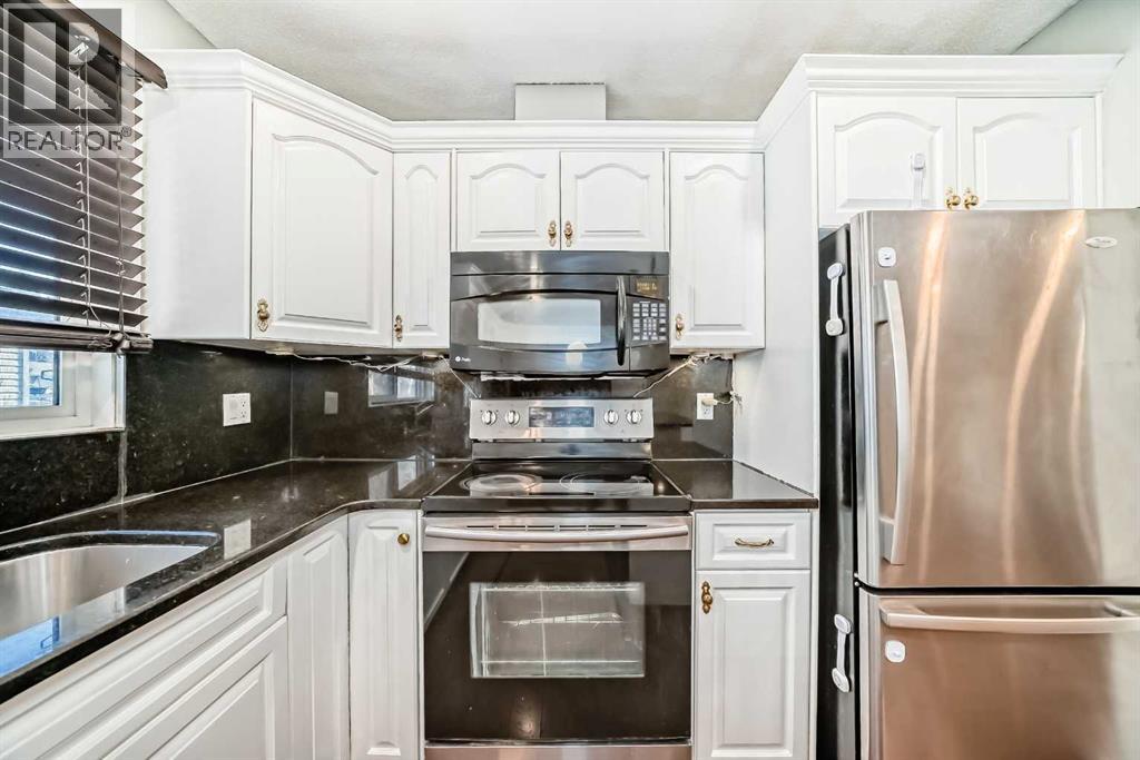 130 Braniff Crescent Sw, Calgary, Alberta  T2W 2M4 - Photo 9 - A2269587