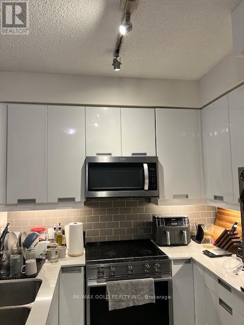 410 - 65 Watergarden Drive E, Mississauga, Ontario  L5R 0G8 - Photo 16 - W12659082