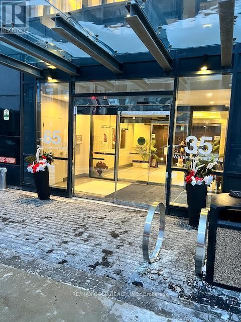 410 - 65 Watergarden Drive E, Mississauga, Ontario  L5R 0G8 - Photo 2 - W12659082