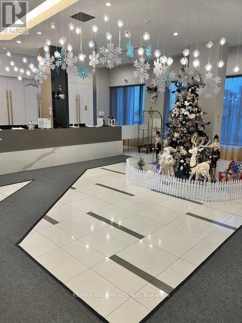 410 - 65 Watergarden Drive E, Mississauga, Ontario  L5R 0G8 - Photo 4 - W12659082