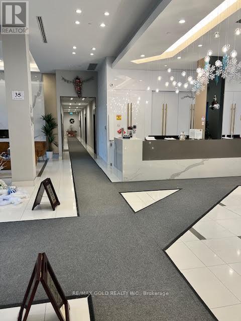 410 - 65 Watergarden Drive E, Mississauga, Ontario  L5R 0G8 - Photo 5 - W12659082