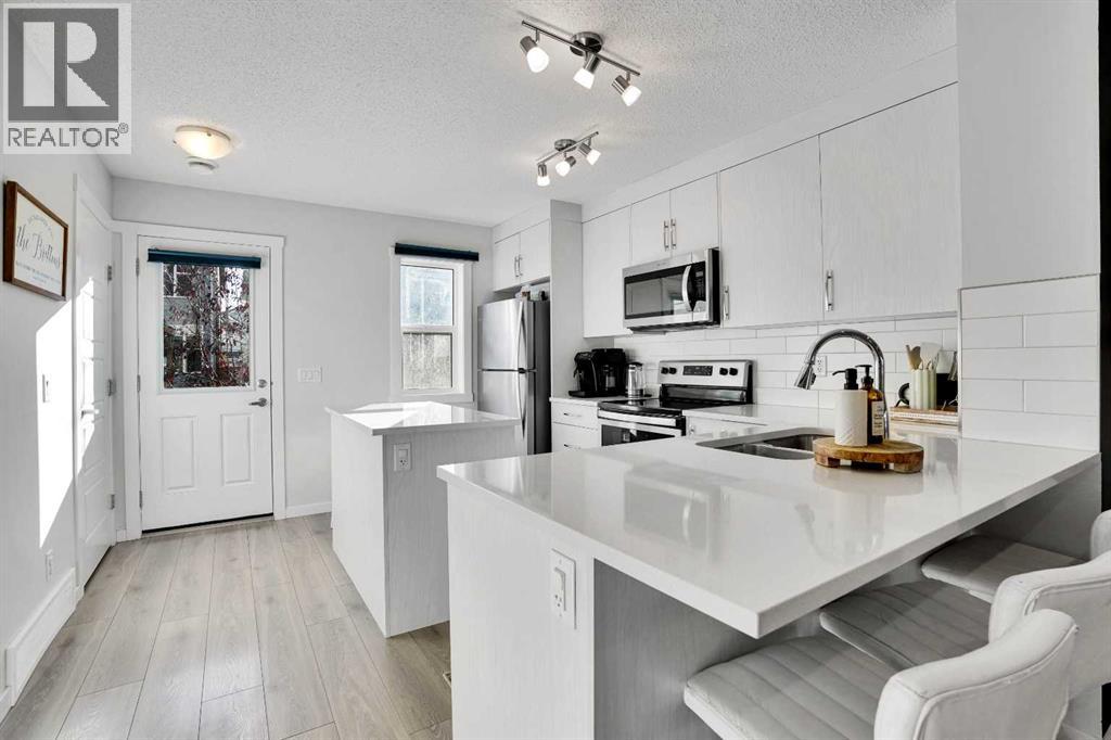 128 Cranbrook Square Se, Calgary, Alberta  T3M 3E3 - Photo 3 - A2276848