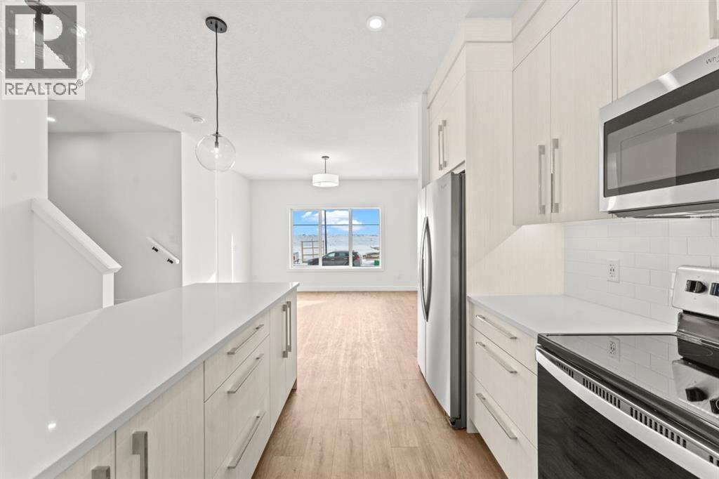 99 Raven Point Se, Calgary, Alberta  T3S 0E8 - Photo 3 - A2269627