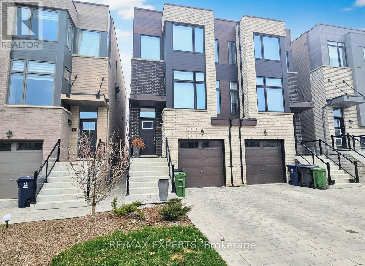 15 Wild Rose Gardens, Toronto, Ontario  M6L 0A5 - Photo 2 - W12658818