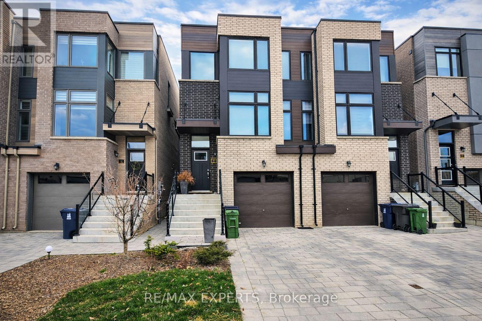 15 Wild Rose Gardens, Toronto, Ontario  M6L 0A5 - Photo 1 - W12658818