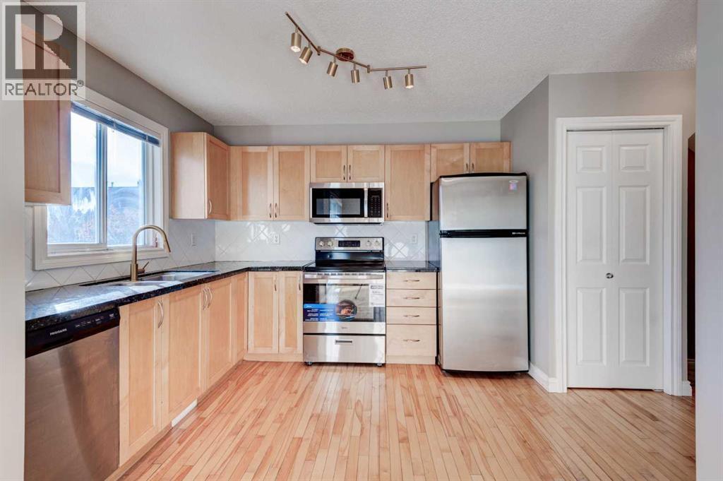 66 Cedarwood Lane Sw, Calgary, Alberta  T2W 6J3 - Photo 6 - A2265127