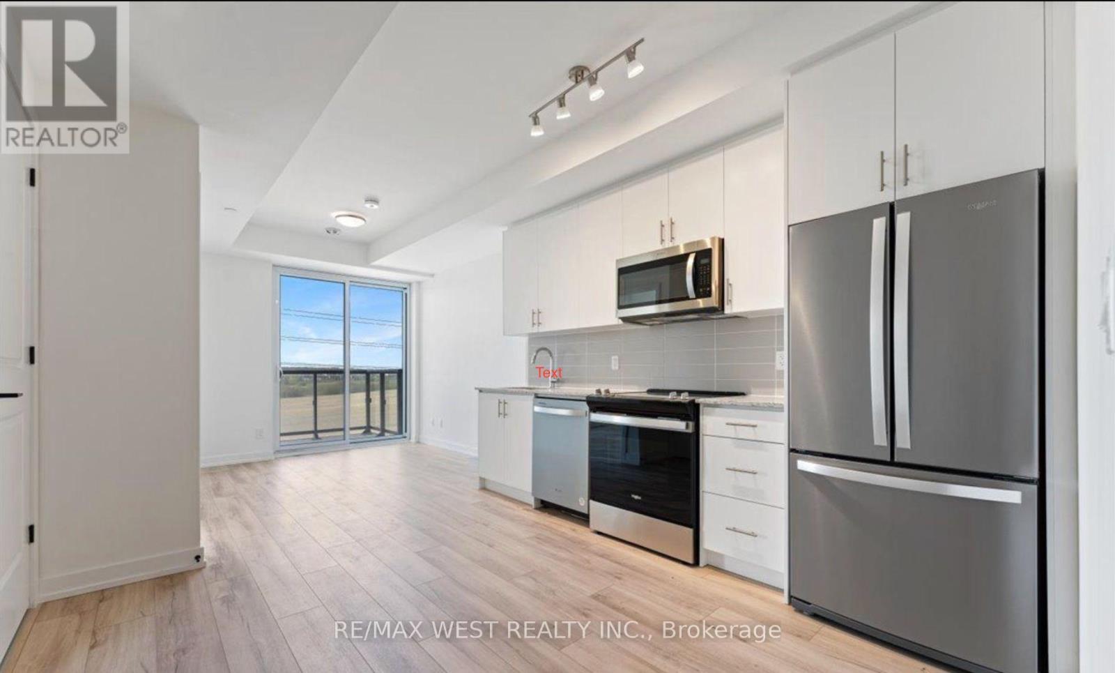 411 - 335 Wheat Boom Drive, Oakville, Ontario  L6H 7C2 - Photo 1 - W12659766