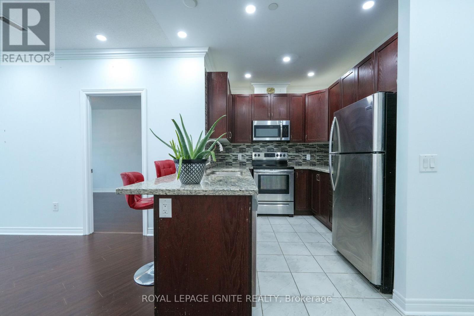 409 - 39 New Delhi Drive, Markham, Ontario  L3S 0E1 - Photo 11 - N12659878