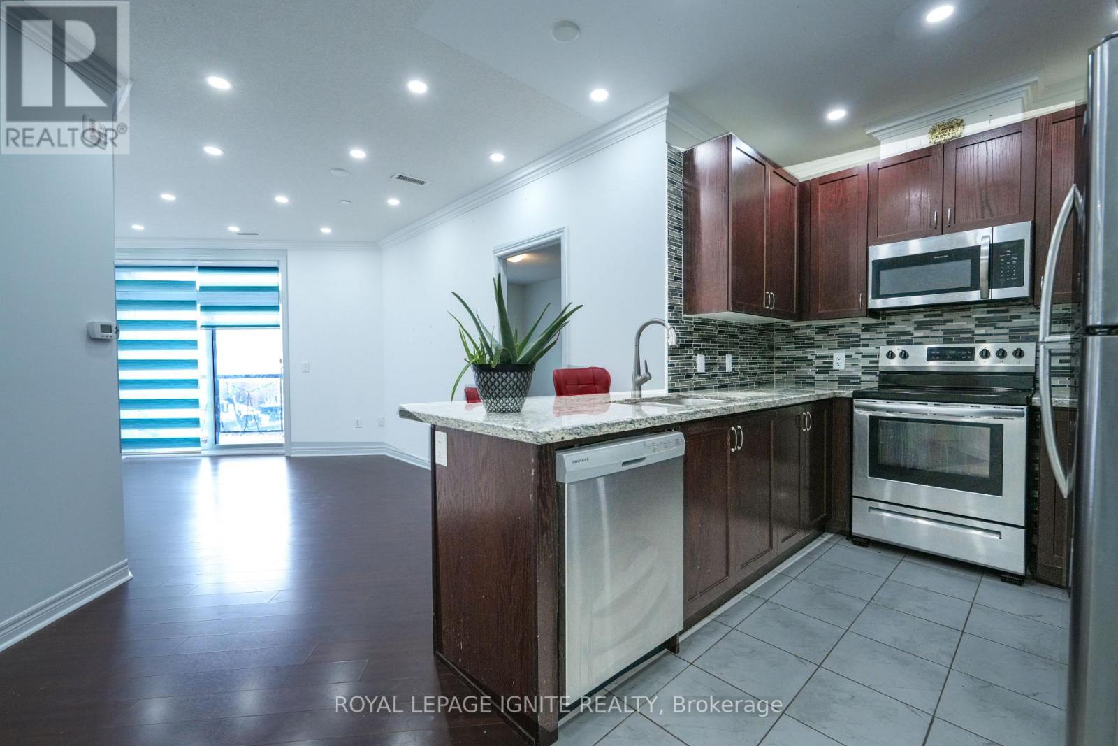 409 - 39 New Delhi Drive, Markham, Ontario  L3S 0E1 - Photo 8 - N12659878