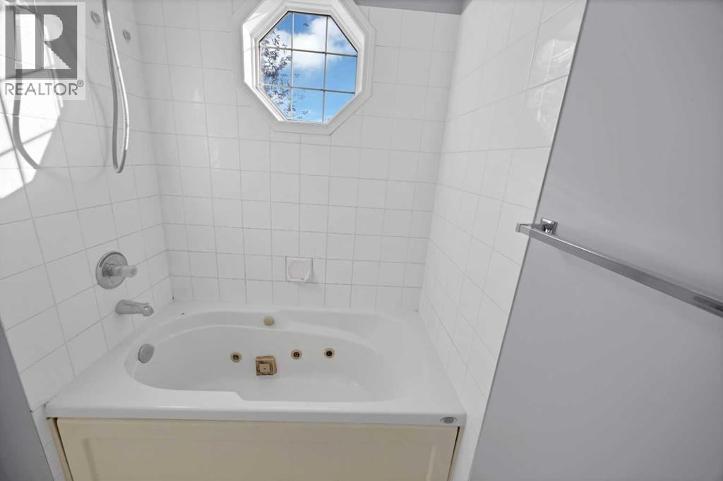 73 Hidden Spring Green Nw, Calgary, Alberta  T3A 5N2 - Photo 37 - A2275052