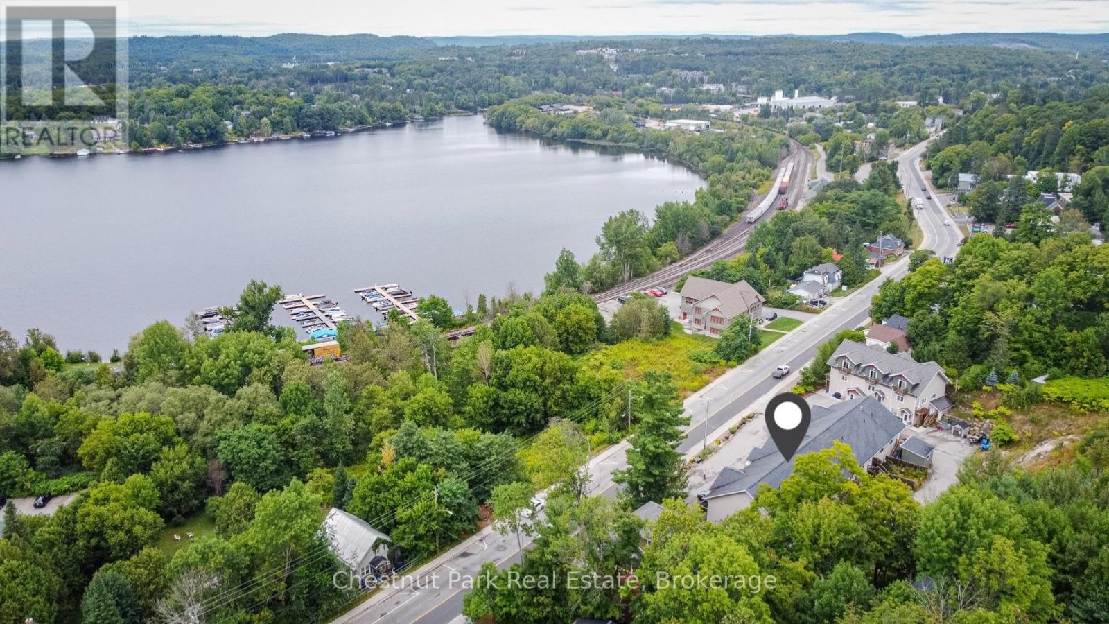 <h3>$499,900</h3><p>5 - 99 Main Street W, Huntsville, Ontario</p>