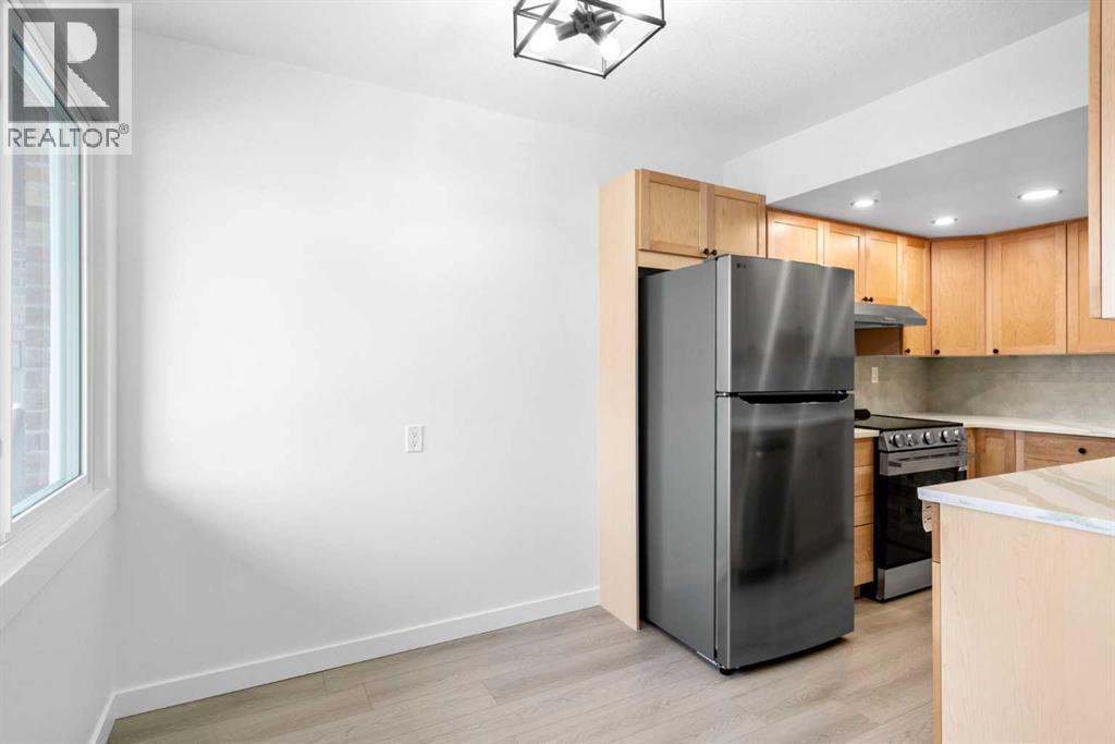 10, 1055 72 Avenue Nw, Calgary, Alberta  T2K 5S4 - Photo 3 - A2273345
