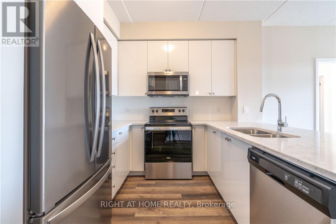 407 - 610 Farmstead Drive, Milton, Ontario  L9T 8X5 - Photo 6 - W12657798