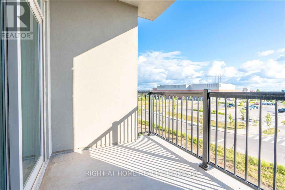 407 - 610 Farmstead Drive, Milton, Ontario  L9T 8X5 - Photo 9 - W12657798