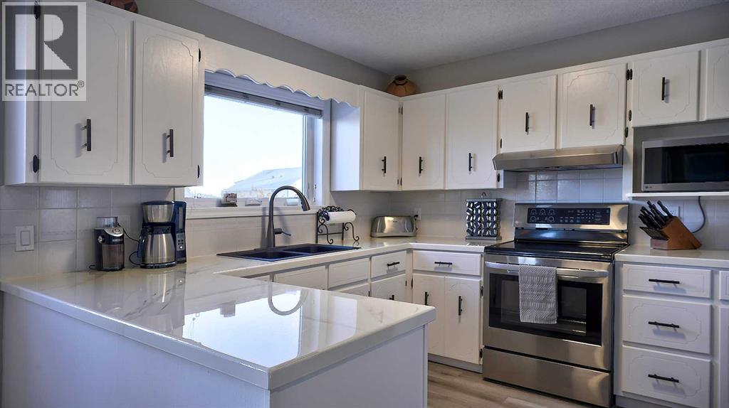 78 Athabasca Crescent, Crossfield, Alberta  T0M 0S0 - Photo 23 - A2276038