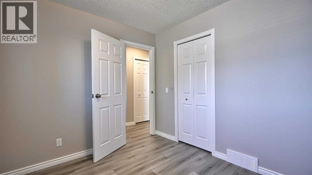 78 Athabasca Crescent, Crossfield, Alberta  T0M 0S0 - Photo 35 - A2276038