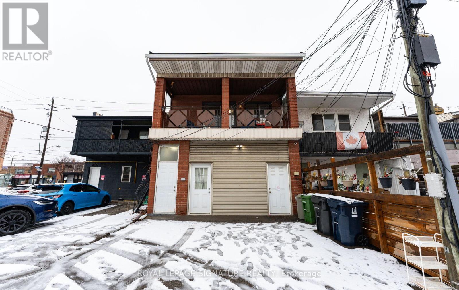 #rear - 713 The Queensway, Toronto, Ontario  M8Y 1L2 - Photo 1 - W12660658